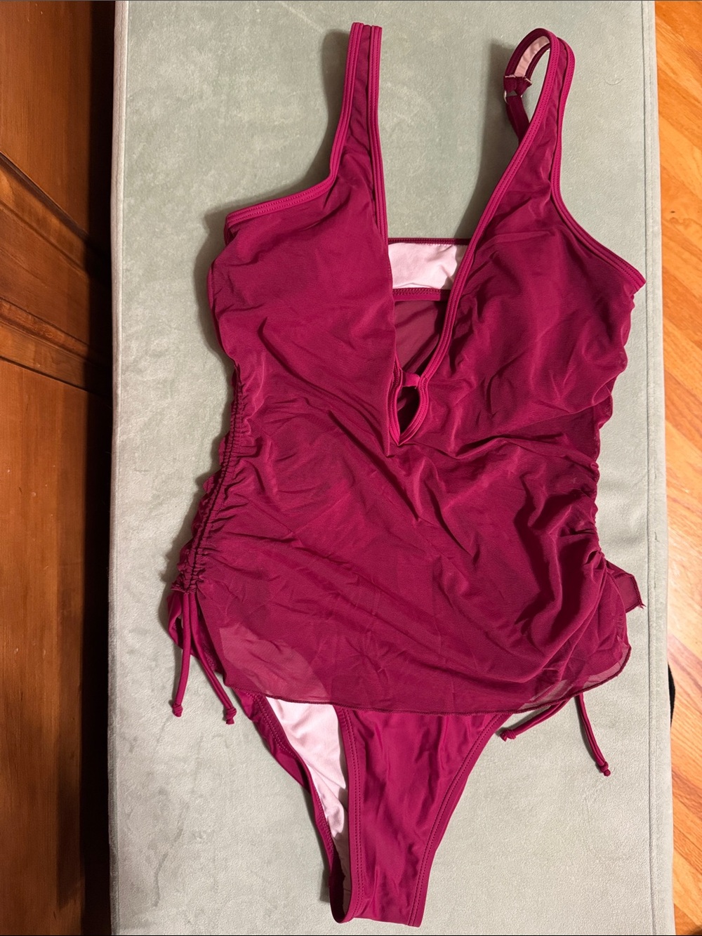 Ladies Ruched burgundy One-Piece Swimsuit with V-Neck.
